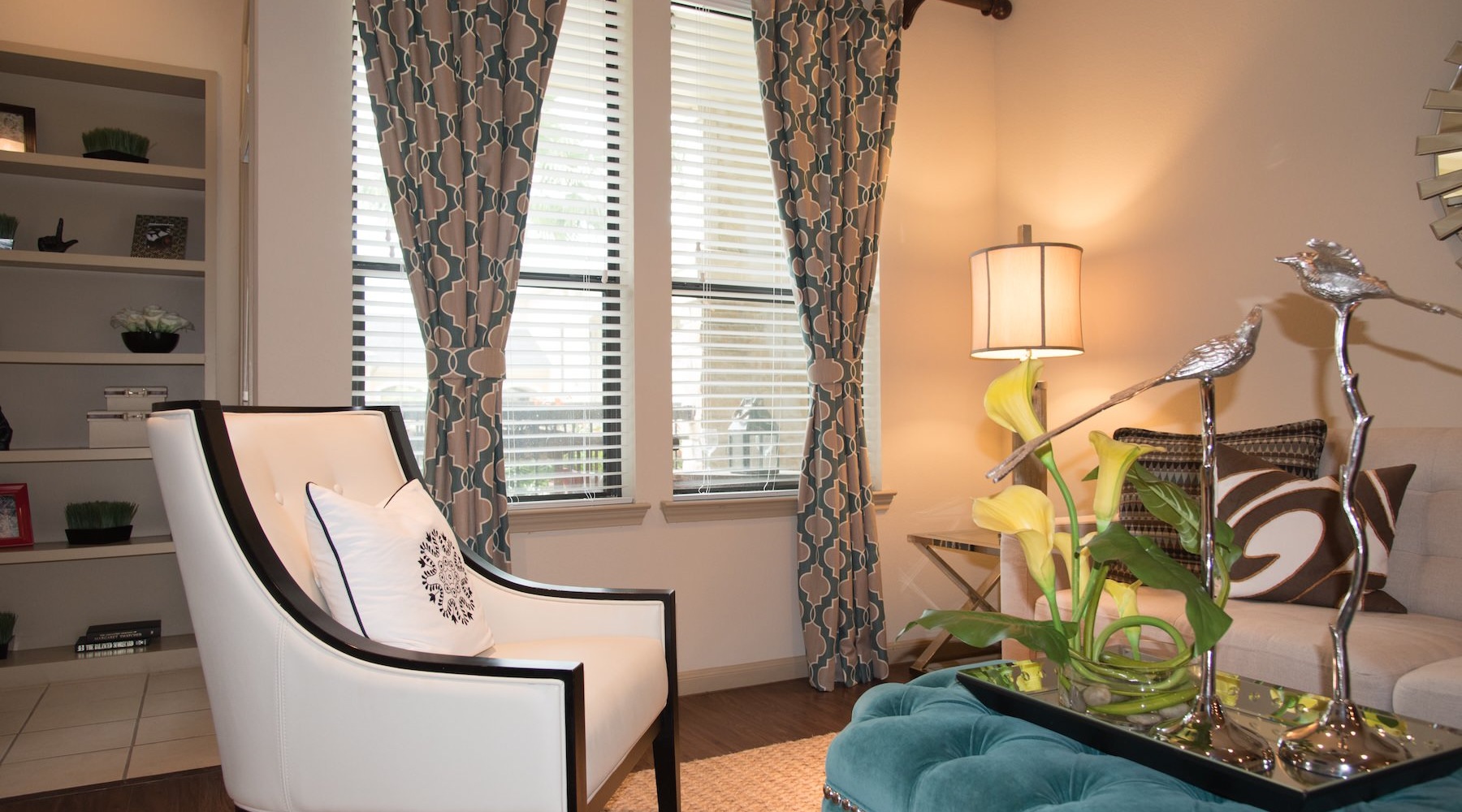 a living room with a couch and a chair